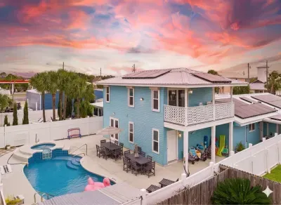 Plenty of room to enjoy the private heated-optional pool. Note, the raised spa area is not a hot tub.