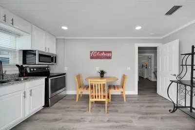 Secondary kitchen is well equipped for morning cereal with the littles or poolside food and drink prep.