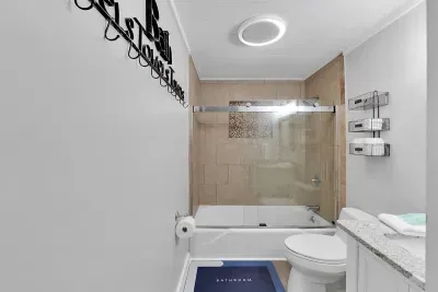 Hall bathroom is a full bathroom. "The house had all the little details of lots of hooks, and towels and 4 big spacious bedrooms." -Jill