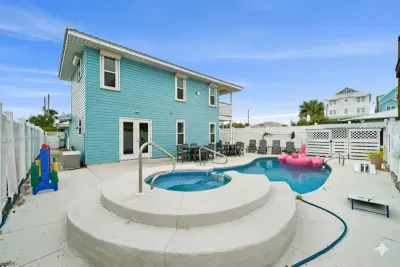 Plenty of room to enjoy the private heated-optional pool. Note, the raised spa area is not a hot tub.