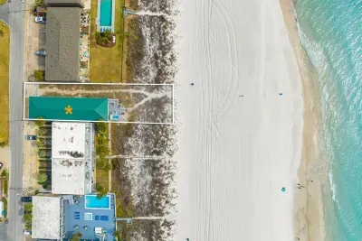 Directly on the beach, you may awake and fall asleep with the sound of the surf just outside the door. Perfect for families and groups. 