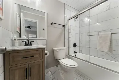 First floor en suite bathroom for the larger east bedroom.