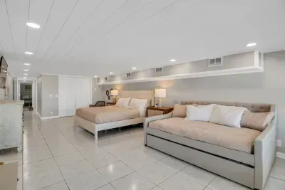 Families will especially love this bedroom with a King bed and Full-Over-Single trundle to keep everyone sleeping comfortably after a fun day in the sun. Each bedroom is equipped with a closet and luggage stand.