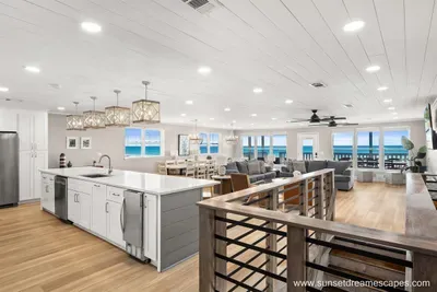 The cooks of the trip won't miss the conversation in this centrally located and fully appointed kitchen. Quartz countertops allow for cooking for a crowd while the ice maker in the 13+ foot(!) kitchen island makes loading the cooler a breeze!
