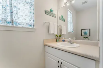 A powder room on the upper level keeps everyone comfortable during gatherings.