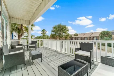 There's just one set of homes between you and the beach! Beach access is just 100 steps away on a flat walk.