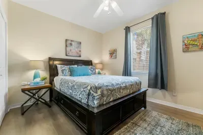 The lower level has 2 bedrooms: one Queen bedroom and one Bunk Bed room. Both are serviced by the nearby full bathroom. A view of the pool is just out the window!