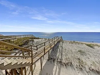 The dunes are natural and ever changing- the steps and sand may look different during your visit, depending on Mother Nature's wind and waves.