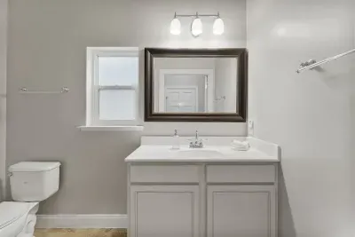 A powder room keeps crowds comfortable while gathering for meals or fellowship. This 1/2 bath is also a welcomed amenity for anyone staying in the living room pull-out couch.