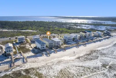Nestled in the natural beauty of Cape San Blas, "A Wave From It All" is your escape to beach front relaxation, but is still close enough to the mainland to "run into town" for activities or necessities.