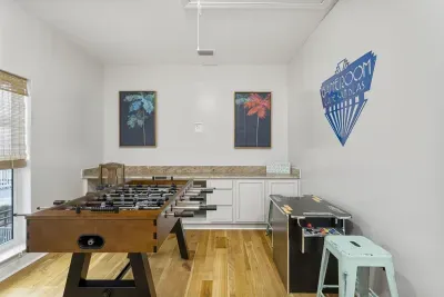 2nd level gameroom is the perfect place for kids of all ages to continue the family fun. There is a foosball table and digital arcade.