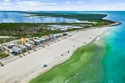 Nestled in the natural beauty of Cape San Blas, "A Wave From It All" is your escape to beach front relaxation, but is still close enough to the mainland to "run into town" for activities or necessities.