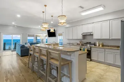 You won't miss a movie scene or play of the game while cooking in this open concept kitchen.