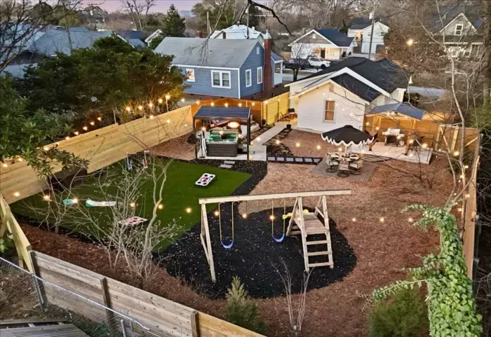 Play, relax, soak, and eat...this backyard has it all.