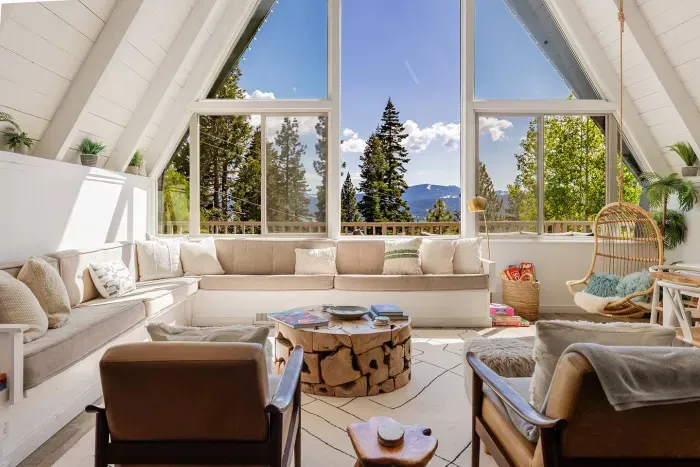 The lake, the mountains, the pine trees and perfect fluffy clouds. You'll never want to leave with views like these!