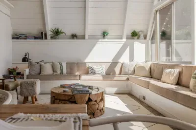The afternoon sun hits just right on our extra large wrap-around  sofa. We have tons of books and games for you to enjoy with the whole family.