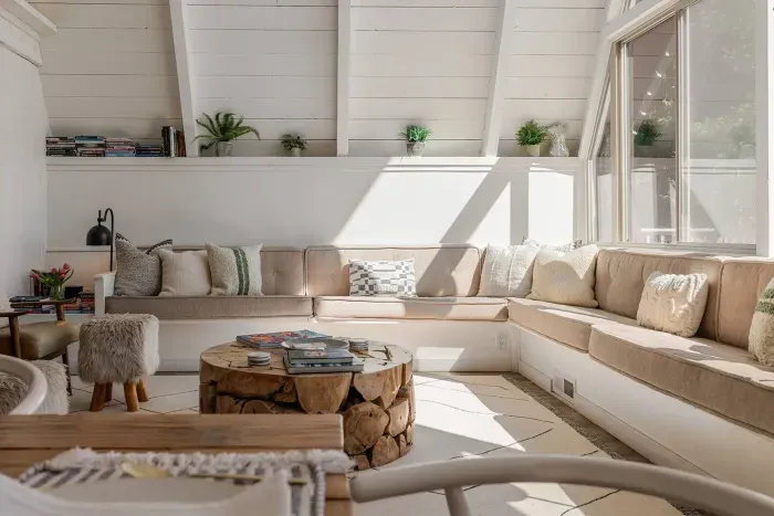 The afternoon sun hits just right on our extra large wrap-around  sofa. We have tons of books and games for you to enjoy with the whole family. 