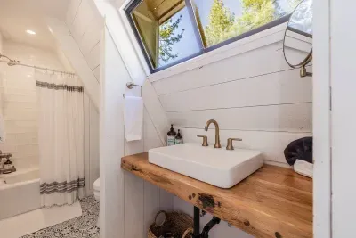 The second level bathroom is located just near the primary bedroom & loft area