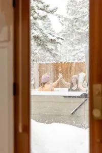 Cheers to après ski at Stuga '66! The salt water spa is just steps from the main living area, and towels are provided
