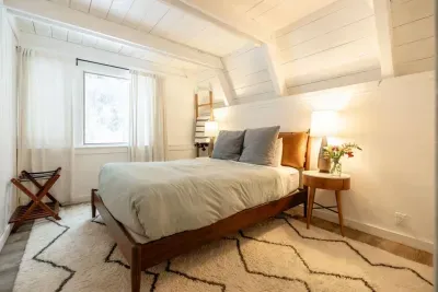 Featuring a queen sized bed and high quality linens, this bedroom is located on the first level and just near the kids bedroom.