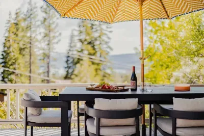 Looking to dine alfresco? This is the perfect spot tucked in the forest on our deck, with peak-a-boo lake views.