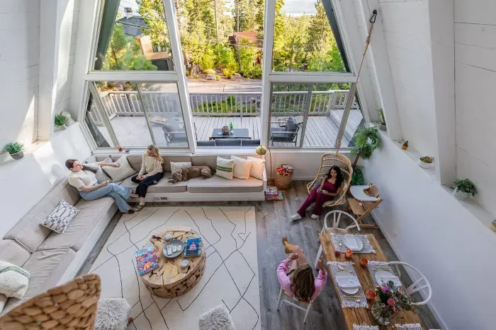 Cozy up in the great room with our custom built in sofa, swinging chair and views from every angle