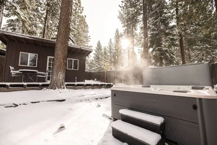 The backyard features a brand new Hot Springs hot tub in the backyard to relax in after a long day on the slopes.