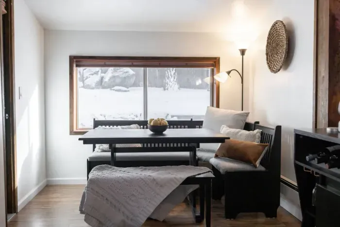 The dining nook has nice big windows into the back yard which allows for plenty of lighting.  You'll love watching the snow fall back here!