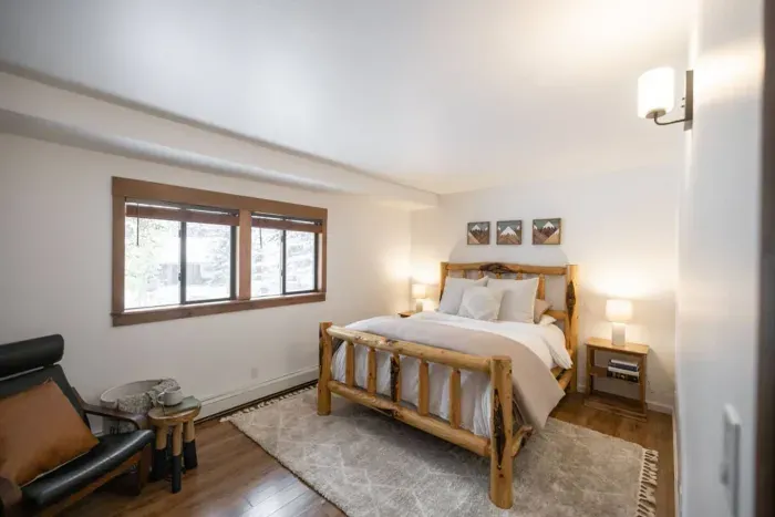 Bedroom #2 features a queen size bed and seating area.