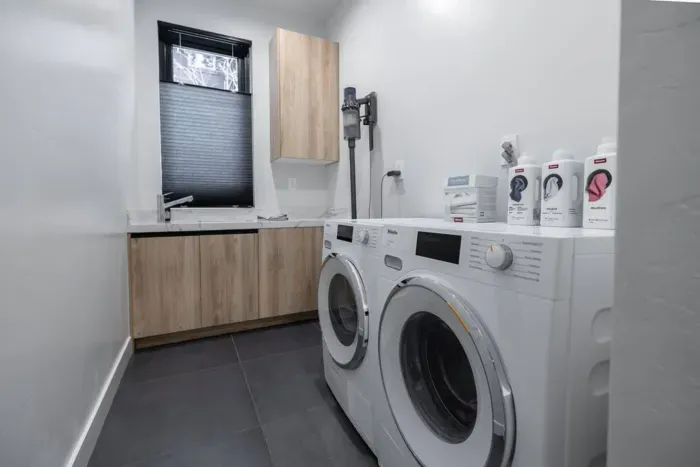 Our laundry room features  brand new modern Miele washer and dryer set. We supply plenty of detergent.