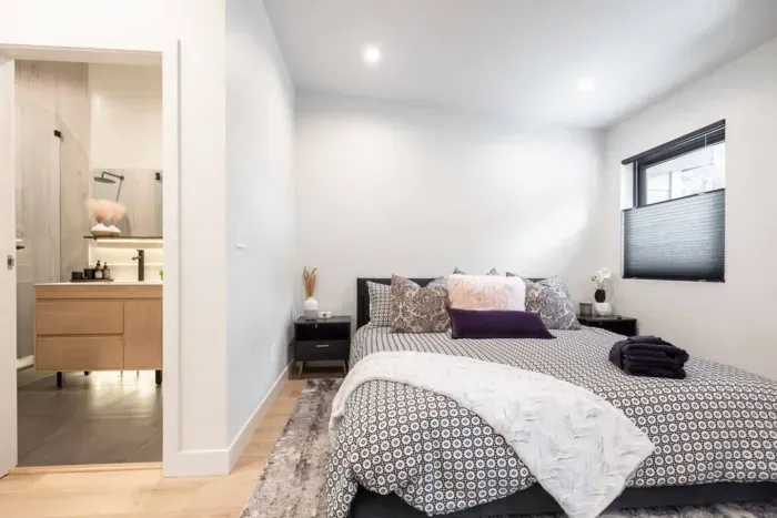 More angles on the secondary suite. It is the first room on the right at the top of the stairs.