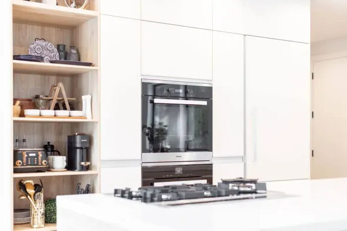 Our kitchen features brand new Miele appliances throughout, including dual ovens, gas cooktop, and large built in refrigerator