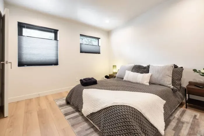 The third bedroom is located just to the left at the top of the stairs and features a queen size bed.