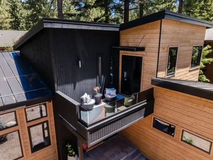 The upper patio just off the secondary living room upstairs, one of three outdoor spaces!