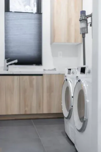 Plenty of space in the laundry room to fold or store supplies. Brand new Miele washer & dryer and Miele detergent are included