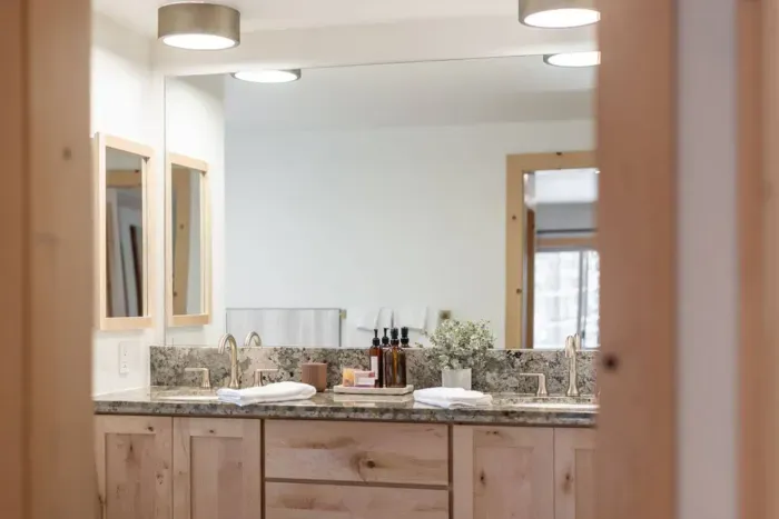 View into our primary suite bath. We proudly feature Sparta Candle Co's soaps and lotions!