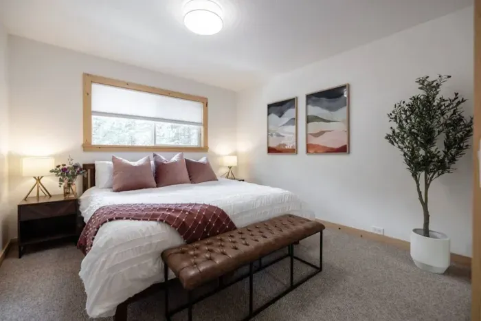 One of three bedrooms upstairs-each has a King sized bed and gets tons of natural light!