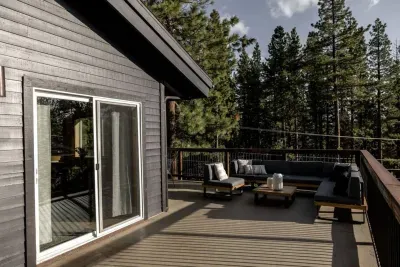 View of our expansive upper deck with plenty of seating for your group! We have a propane BBQ on this upper deck as well