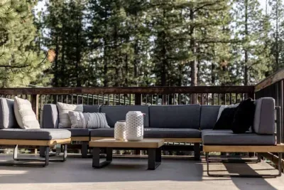 Our upper level deck features a comfortable couch with room for everyone, gas BBQ, dining table + chairs, and is the BEST place to take in the forest views and the sunset over Mt Tallac.