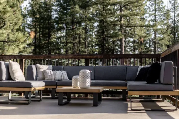 Our upper level deck features a comfortable couch with room for everyone, gas BBQ, dining table + chairs, and is the BEST place to take in the forest views and the sunset over Mt Tallac.