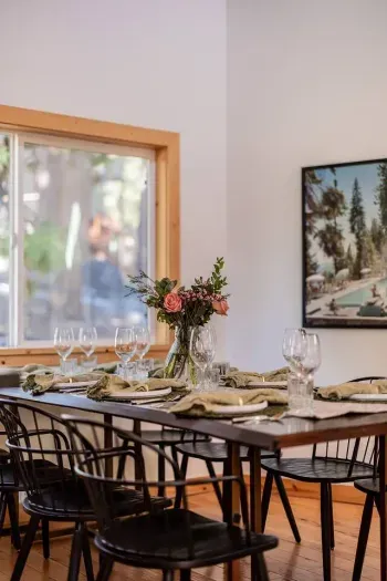 Our dining table comfortably seats 8, with extra chairs and 2 high chairs available onsite. Our kitchen is fully stocked for cooking an amazing meal.