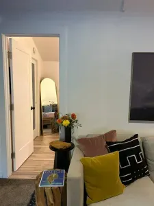 A peak from the living room into the back bedroom.