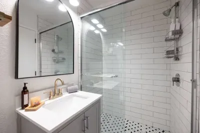 The full bathroom in the mother-in-law unit, with walk-in shower. You'll love the Sparta Candle co soaps and lotions we provide!