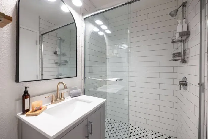 The full bathroom in the mother-in-law unit, with walk-in shower. You'll love the Sparta Candle co soaps and lotions we provide!
