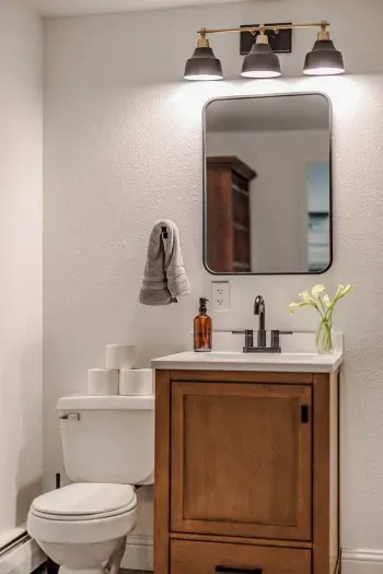 Here is the half bath upstairs, further down the hall.