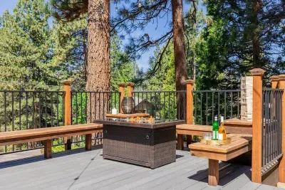 The deck also has a gas fire pit and plenty of bench seating for your entire group.