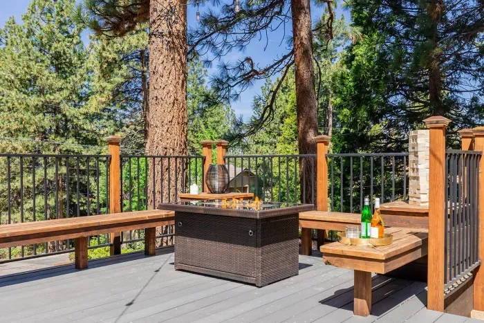The deck also has a gas fire pit and plenty of bench seating for your entire group. 