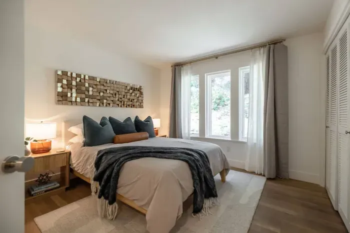 The second bedroom is outfitted with a comfortable queen bed, crisp cotton sheets and blackout shades for the mornings you may want to sleep in-just don't miss first chair! 