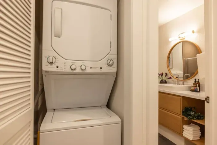 There’s a stacked washer & dryer with laundry supplies provided for you