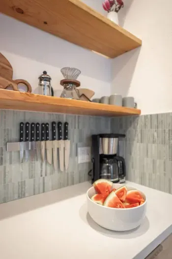 The kitchen has been fully remodeled and outfitted with brand new kitchenware.